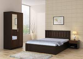 Bedroom set with best in class finishing combo of king size bed + 4 door wardrobe + dressing table with stool and 2 side tables of bed. Ideal Master Bedroom Size In India Novocom Top