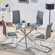 Don't forget to choose a dining set with the appropriate number of pieces so everyone gets a seat at the table. Round Dining Table And Chairs Set Tempered Glass Kitchen Dining Table And 4pcs Gray Faux Leather High Back Chairs Walmart Com Walmart Com