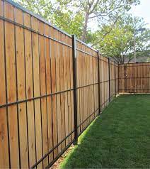 The first advantage steel posts have over the standard wooden 4×4 or 6×6 is cost. Estate Ornamental Privacy Fencing Steel And Wood Fence