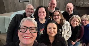 Free Mom Hugs- Oregon volunteers met up with Free Mom Hugs founder Sara  Cunningham and Real Mama Bears founder Liz Dyer who were both in Portland  for the 2026 QCF Conference. The