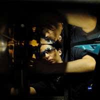 US Navy 060331-N-7711S-099 Electrician's Mate 3rd Class Vinn Strupp repairs  a motor in the rewind shop aboard the Nimitz-class aircraft carrier USS  Ronald Reagan (CVN 76)