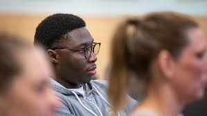 Barber Rich' delivers haircuts, life lessons during Titan Men of Diversity  Week