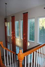 We got a quote from anderson and was out of our budget. Atrium Window Panels With Rod And Rings Modern Window Treatments Atrium Windows Unique Window Treatments