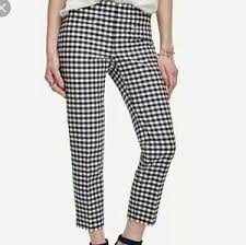 Here's another black shirt outfit worn with tan colored pants and brown. Pants Jumpsuits Black And White Checkered Pants Poshmark