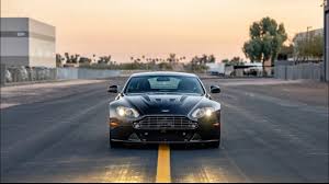 Image result for Onyx Black 2011 Aston Martin