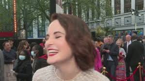 Michelle Dockery dazzles in an intricate silver beaded gown at Downton  Abbey premiere