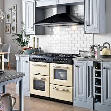 Keep Cream Cooker And Black Hood Grey Cabinets And Subway Tiles Kitchen Kitchen Interior Range Cooker