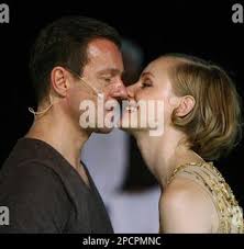 Norman Hacker in the role of Tartuffe and Paula Dombrowski as Elmire, from  left, perform during a dress rehearsal for Moliere's "Tartuffe" at the  Perner-Insel in Hallein, Austria,