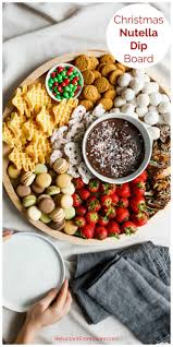 Enjoy A Festive Dessert Board With Christmas Tree Waffles And Nutella Fondue Dip Delicious Served With Hot Chocolate Ch Nutella Dip Nutella Festive Desserts