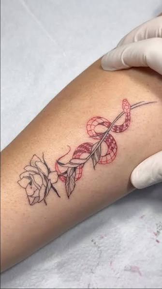 Snake Wrapped Around Roses Tattoo