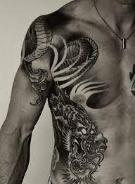 Top 59 Shoulder Tattoos For Men 2021 Inspiration Guide Cool Shoulder Tattoos Japanese Tattoos For Men Dragon Tattoos For Men