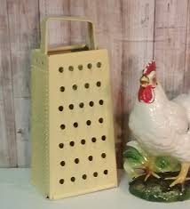 decorative yellow vintage cheese grater