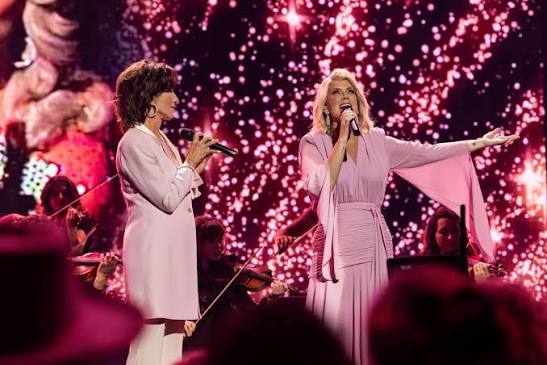 Still feeling and loving this moment with @nataliegrant from @gmadoveawards  . There will never be another like @dollyparton . Watch the full performance  on YouTube or link in bio.