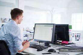 Maybe you would like to learn more about one of these? Man In Office Using Computer Natural Light Businesspeople Stock Photo 159239850
