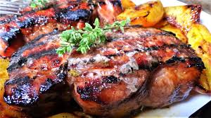 Add a little more olive oil and salt to pork if desired. Grilled Pork Chops With Peaches
