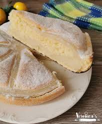 All'interno della planetaria, iniziate mescolando la farina setacciata con l'amido di mais, la vanillina, lo zucchero, il sale, l'uovo, il burro tagliato a cubetti e il lievito per dolci setacciato.impastate fino ad ottenere un panetto liscio e omogeneo.; Torta Crostata Al Limone Bimby Simil Mulino Bianco