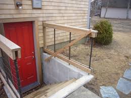 Functional firewood storage on exterior staircase. Solving Our Design Problems Greenbuildingadvisor
