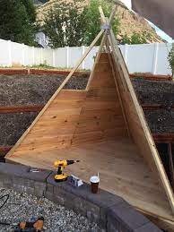 Build An Outdoor Teepee In A Day For About 150 The Decorated Room Teepee Outdoor Backyard Backyard Decor