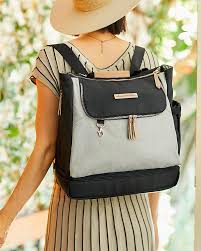 Find great deals for petunia pickle bottom clouds in cologne city carryall diaper bag gray blue. Petunia Pickle Bottom Pivot Pack Sand Black A Modern Silhouette And A Roomy Interior Easy To Convert From A Stylish Bag To A Practical Backpack Unisex Bambini