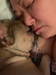 When world's storm is ripping my soul I hug my baby and I know I'm okay for  the moment