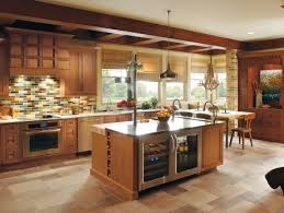 Wood tone cabinets easily create a warm look that can completely change the style of your kitchen. Omega Cabinets Prosource Wholesale