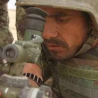 U.S. Marine Corps Lance Cpl. Brennan Reynolds carries