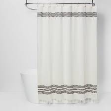 Designed with a geometric pattern that's reminiscent of a beachy resort vacation, the charcoal gray and white curtain includes pops of red, orange, and that'll sit pretty in. Striped Fringe Shower Curtain Off White Threshold Target