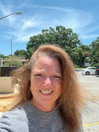 short hair style for women over 50 with frizz issues