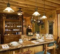 Light and dark wood combo. Rustic Log Cabin Outdoor Lighting Log Home Kitchens Log Home Kitchen Log Cabin Kitchens