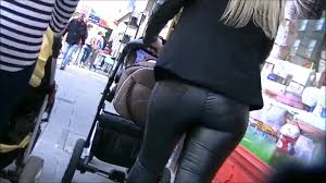 Candid ass in shiny tight leather pants - watch on VoyeurHit.com. The world  of free voyeur video, spy video and hidden cameras