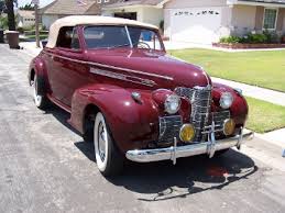 Image result for Trojan Maroon 1939 Oldsmobile
