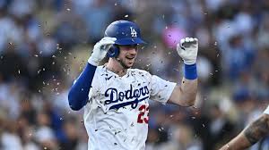 Rojas provides power off the bench as Dodgers take opener from Rays