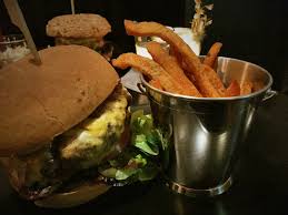 Buffalo with caramelized onions, angus with bacon and natural grass fed beef with american cheese. Drunken Cow Bar Grill Burger Steaks Drinks Biancas Blog