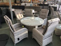 This huge round georgian table dining set is designed to comprise 12 to 14 people. Latte Rattan Dining Set 4 Reclining Chairs