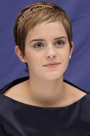 2014 lovely bun emma watson styles her long hair in a lovely bun. Emma Watson S Hair Evolution From Hermione To Belle Emma Watson Short Hair Emma Watson Hair Emma Watson Pixie