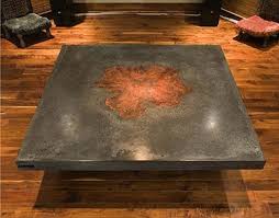 A Concrete And Wood Table Is A Work Of Art Wood Inlay Concrete Table Concrete Wood
