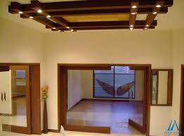 Inspiring False Ceiling Design Work In A Home By Amer Adnan Associats Interiordesign Inte Wood Doors Interior False Ceiling Living Room False Ceiling Design