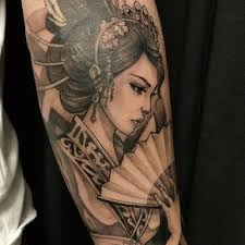 Geisha tattoo on left half sleeve by luis orellana. Geisha Tattoo Main Piece For Sleeve Background Cherry Blossom Tree Ancient Temple And Scenery Geisha Tattoo Japanese Geisha Tattoo Asian Tattoos