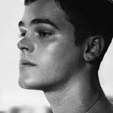 Who wrote “Like Strangers Do” by AJ Mitchell?