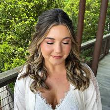 This is our beautiful bridal babe from December. Kate was actually our last  wedding before we were officially Enhanced by EB. We loved how timeless and  classic her bridal look was! •