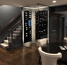 First, the illusion of glass makes the cellar appear as if it is taking up minimal space. Glass Enclosed Wine Cellars Stact Wine Racks
