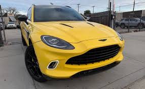 Image result for New Yellow 2017 Aston Martin