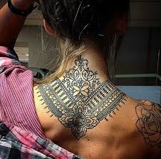 Girl With A Tattoo On The Back Of Her Neck Of A Mandala Design Neck Tattoo Tattoos Tattoos For Women