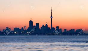 Was trying to capture a toronto sunrise from etobicoke , as it is one of the most beautiful places in the city in the morning Toronto Skyline With Cn Tower And The Financial District At Sunrise Stock Photo Picture And Royalty Free Image Image 2719420