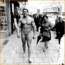 Arnold Schwarzenegger Walking Through Munich in Swimming Trunks in Order to  Promote His Own Gym 1967 : rpics