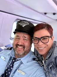 Riding Amtrak Mardi Gras train with conductor