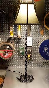 Mounted on double black marble base with a brass flower design on base. Industrial Chain Link Lamp 7 Steps With Pictures Instructables