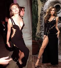Hurley stole the show in a plunging black versace dress at the london premiere of four. Elizabeth Hurley Recreating Her Versace Dress 1994 2018 Oldschoolcool Versace Dress Elizabeth Hurley Dresses