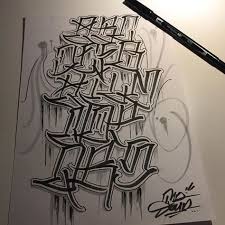 It features a set of characters with creative curves . 64 Ideas For Tattoo Fonts Cursive Gangster Tattoo Fonts Cursive Tattoo Lettering Fonts Graffiti Lettering