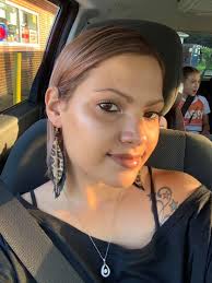 Copper and plum eye makeup with nude lip